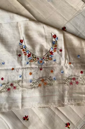 Cream loom tussar saree with all over designer embroidery