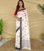 White heritage with a royal touch  tussar silk saree