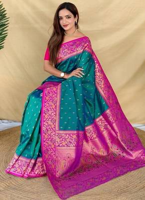 teal green soft silk saree adorned with delicate zari woven buttas 5