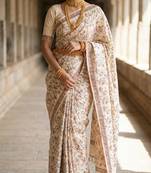 Cream loom tussar saree with all over designer embroidery