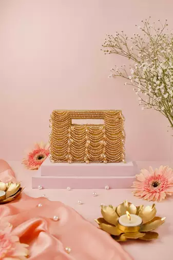 Amyra gold suede handcrafted clutch