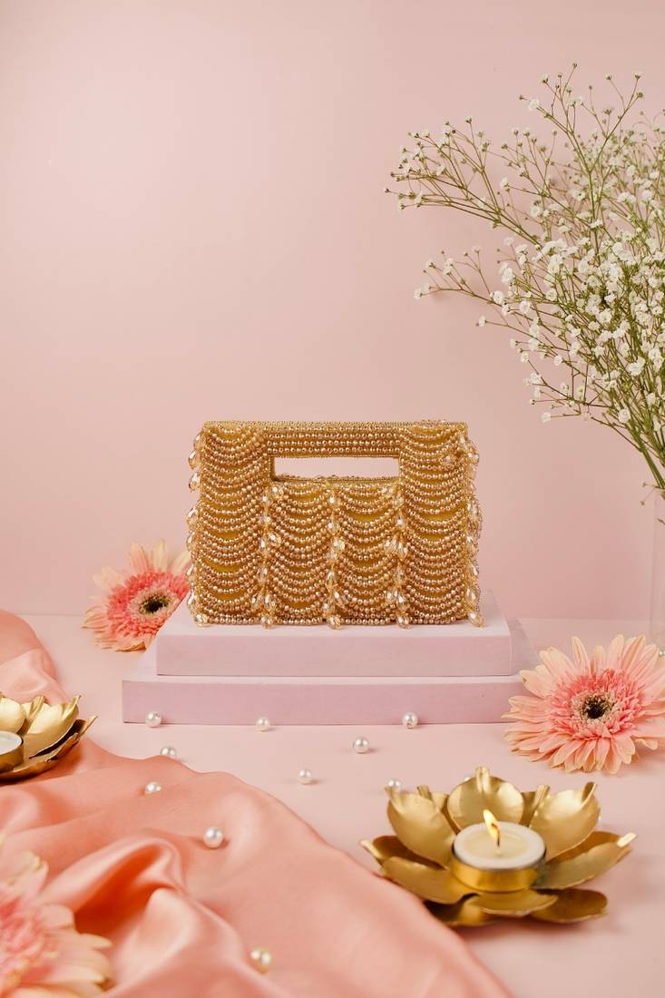 Amyra gold suede handcrafted clutch