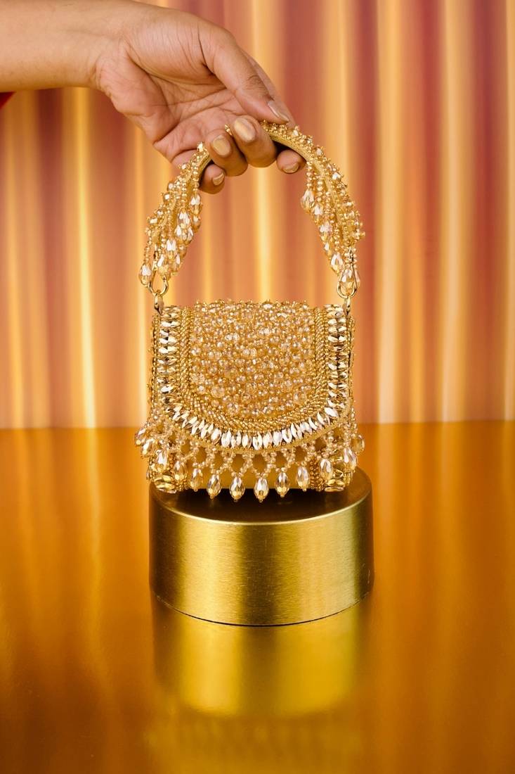 Josy gold suede embellished mini bag