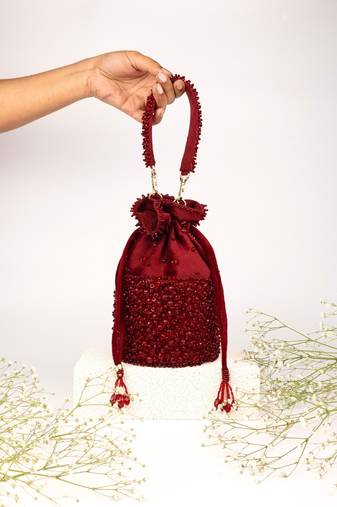 Zaria maroon suede crystal embellished bucket bag