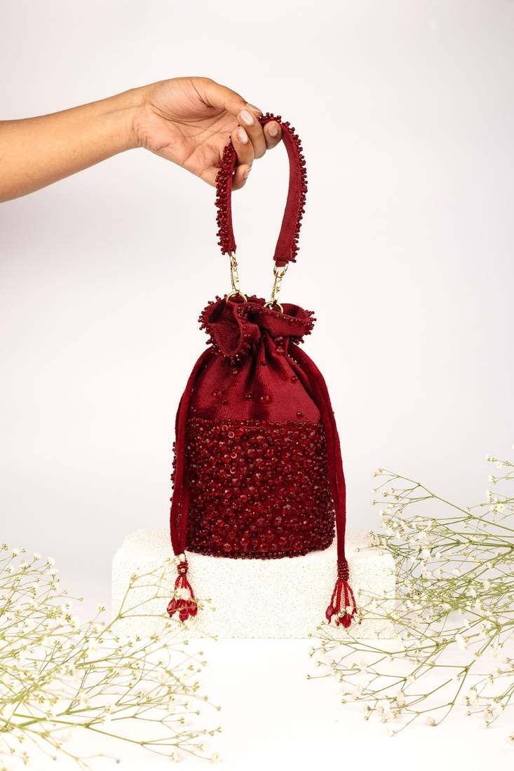 Zaria maroon suede crystal embellished bucket bag