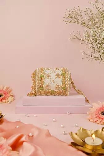 Bella pastel suede embellished cylinder mini bag