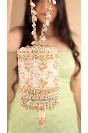 Bella pastel suede embellished cylinder mini bag