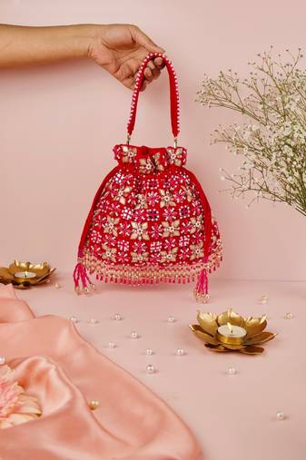 Rida magenta suede gota mirror embellished potli