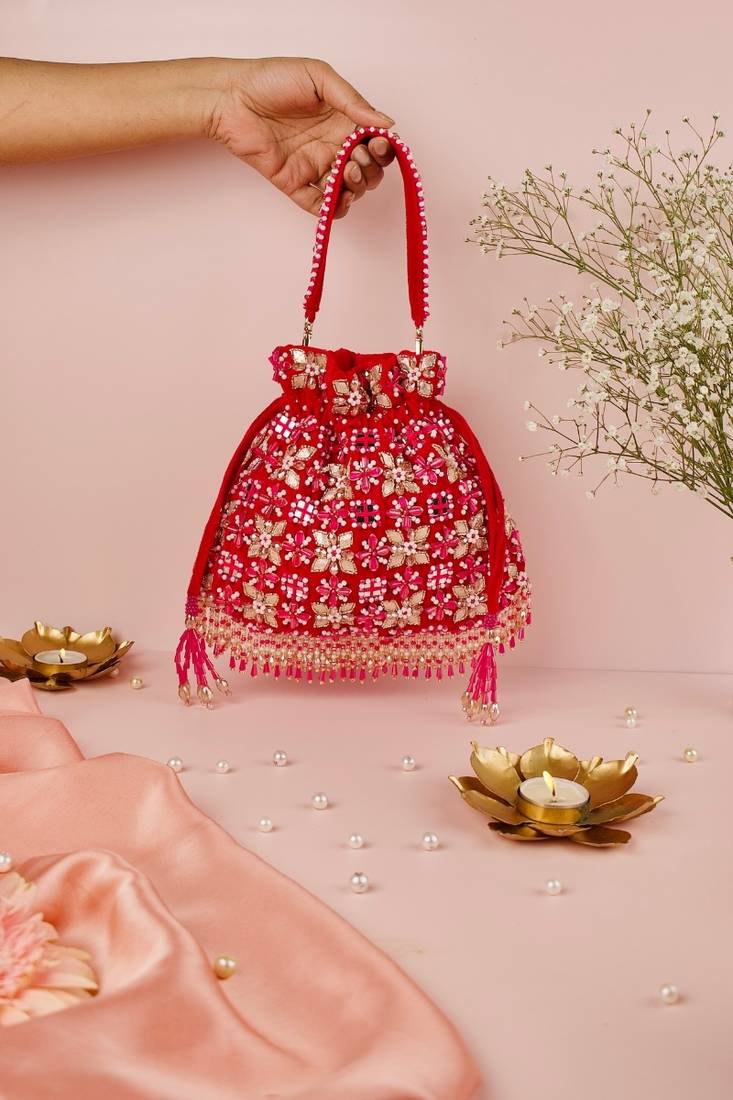 Rida magenta suede gota mirror embellished potli