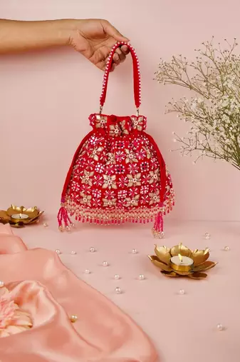 Rida magenta suede gota mirror embellished potli