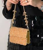 Kiyara gold suede crystal embellished mini bag