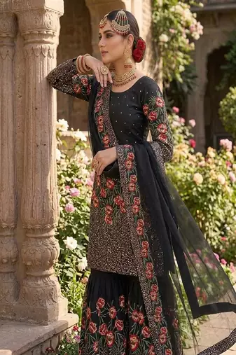 Designer black silk kurta set with heavy floral embroidery & sharara