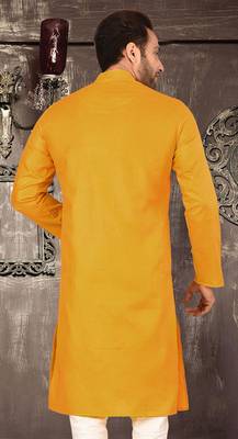 Yellow cotton kurta with pattern work and fancy button 4