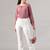 Women solid white regular fit mid-rise flat front trousers