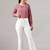 Women solid white regular fit mid-rise flat front trousers