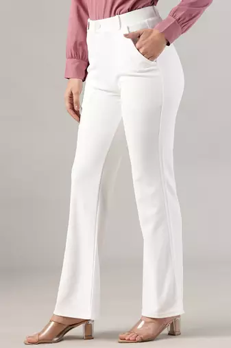Women solid white regular fit mid-rise flat front trousers