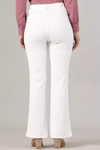 Women solid white regular fit mid-rise flat front trousers