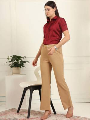 Women solid beige regular fit mid-rise flat front trousers 2