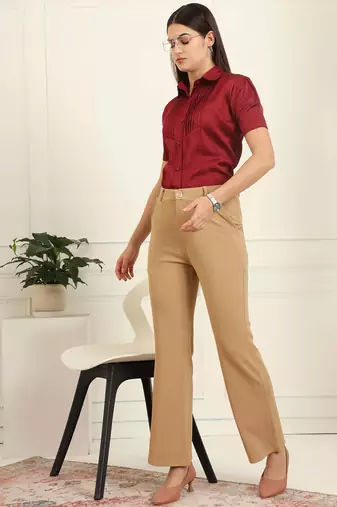 Women solid beige regular fit mid-rise flat front trousers