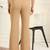 Women solid beige regular fit mid-rise flat front trousers