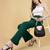 Women solid green regular fit mid-rise flat front trousers