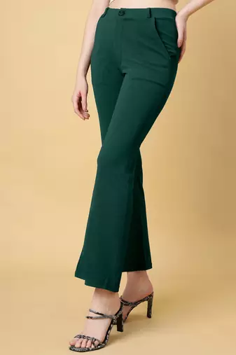 Women solid green regular fit mid-rise flat front trousers