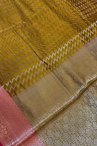 Banarasi semi silk saree in mustard colour with zig-zag  work