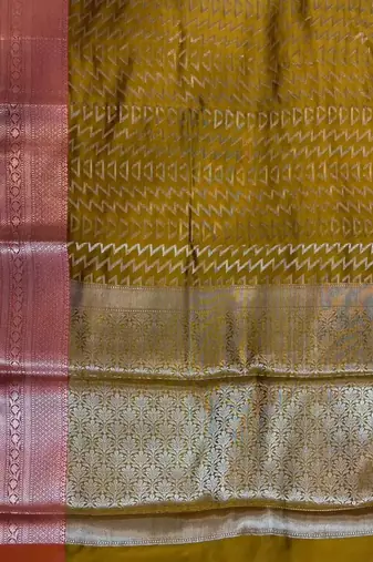 Banarasi semi silk saree in mustard colour with zig-zag  work