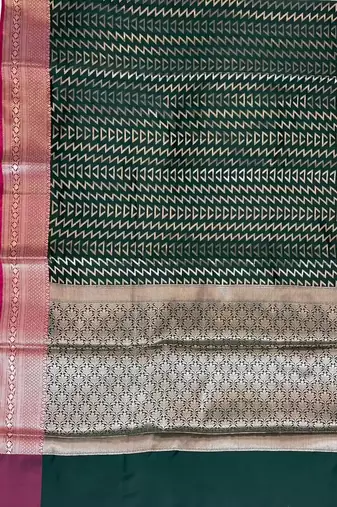 Banarasi semi silk saree in bottle green colour with zig-zag  work