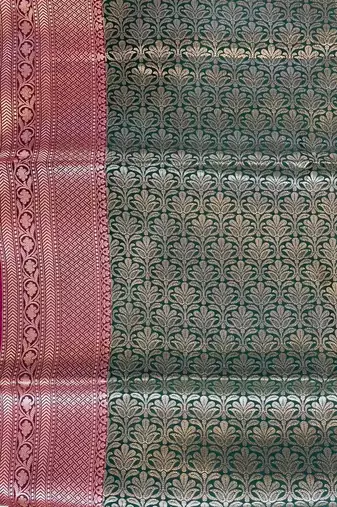 Banarasi semi silk saree in bottle green colour with zig-zag  work