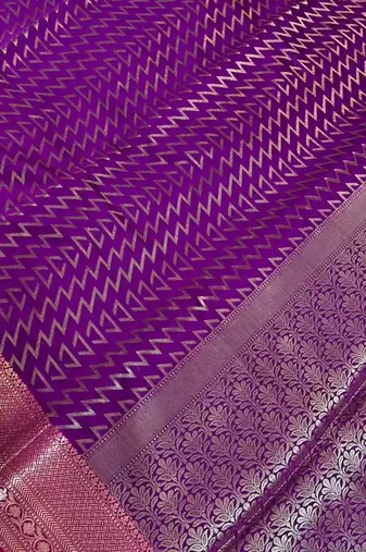 Banarasi semi silk saree in magenta colour with zig-zag  work