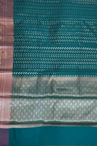 Banarasi semi silk saree in turquoise colour with zig-zag  work