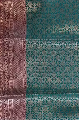 Banarasi semi silk saree in turquoise colour with zig-zag  work