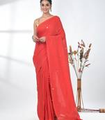 Elegant red cotton handspun saree with sequin embellishments and pom pom