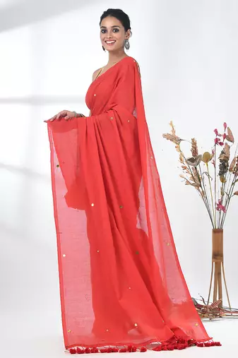 Elegant red cotton handspun saree with sequin embellishments and pom pom