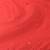Elegant red cotton handspun saree with sequin embellishments and pom pom