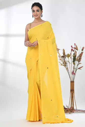 Elegant yellow cotton handspun saree with sequin embellishments and pom pom