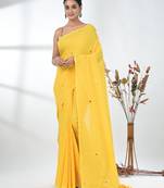 Elegant yellow cotton handspun saree with sequin embellishments and pom pom