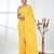 Elegant yellow cotton handspun saree with sequin embellishments and pom pom