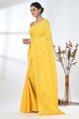 Elegant yellow cotton handspun saree with sequin embellishments and pom pom