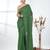 Elegant green cotton handspun saree with sequin embellishments and pom pom