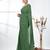 Elegant green cotton handspun saree with sequin embellishments and pom pom
