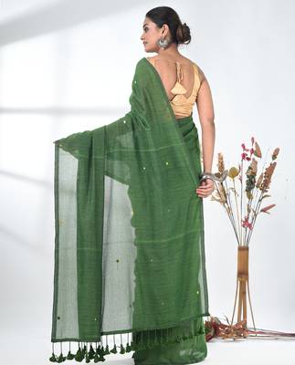 Elegant green cotton handspun saree with sequin embellishments and pom pom 3