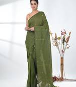 Elegant sap green cotton handspun saree with sequin embellishments and pom pom