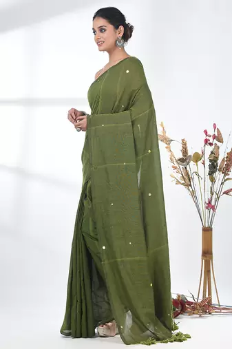 Elegant sap green cotton handspun saree with sequin embellishments and pom pom