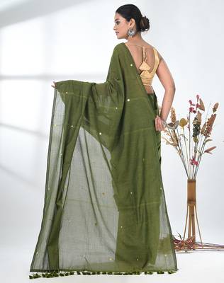 Elegant sap green cotton handspun saree with sequin embellishments and pom pom 3