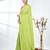 Elegant lime green cotton handspun saree with sequin embellishments and pom pom