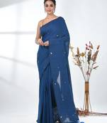 Elegant sapphire blue cotton handspun saree with sequin embellishments and pom pom