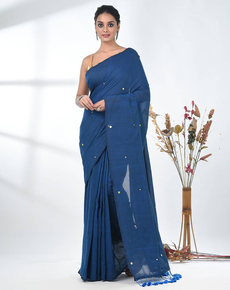 Elegant sapphire blue cotton handspun saree with sequin embellishments and pom pom