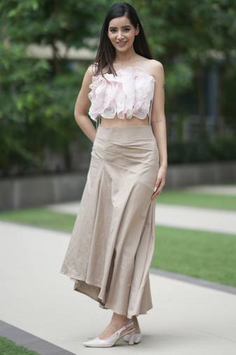 Soft pink ruffled top with pleated linen long skirt